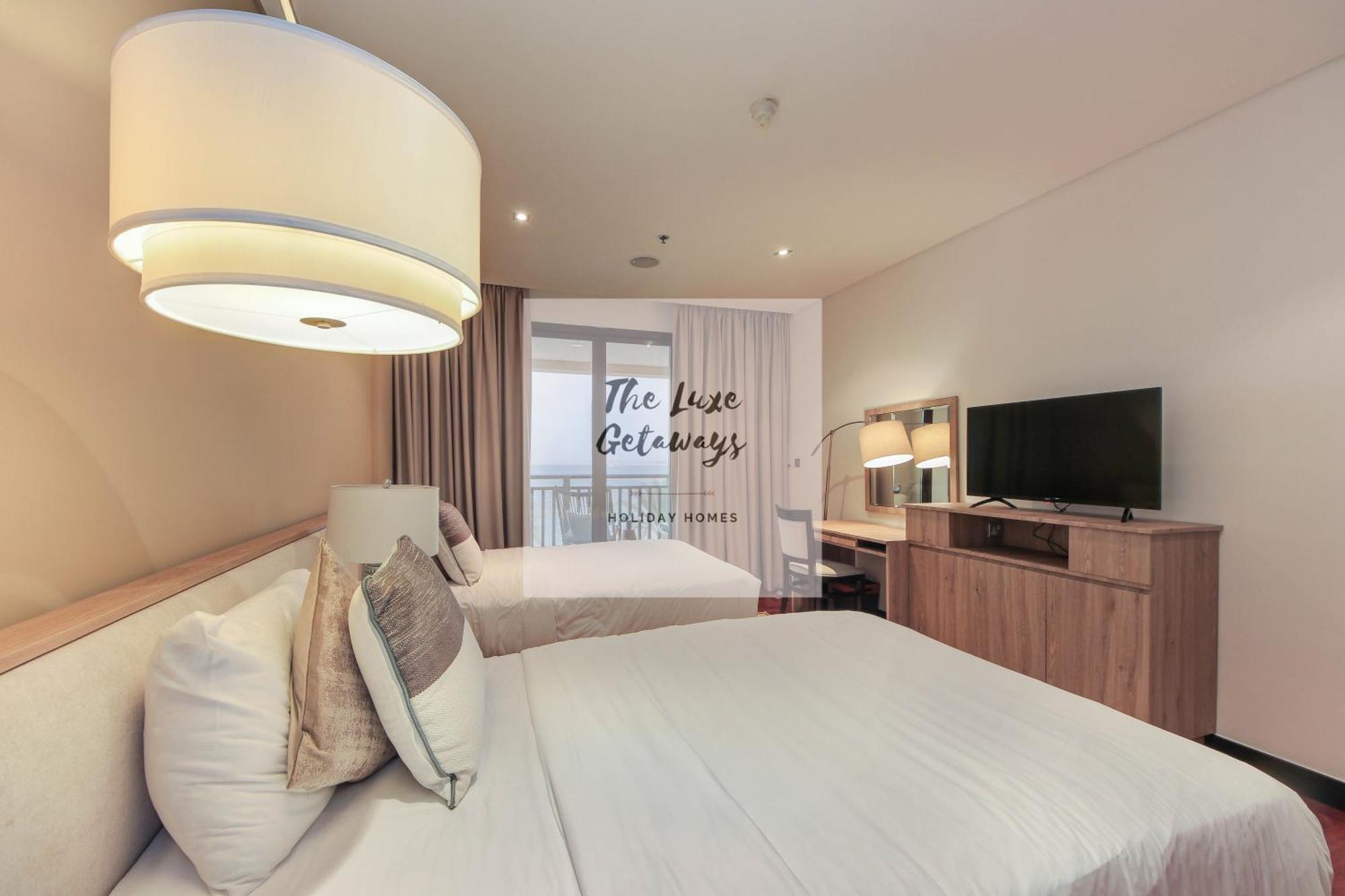 Luxe Getaways Royal Amwaj Palm Jumeirah Resort Apartment Holiday Home Dubai Bagian luar foto